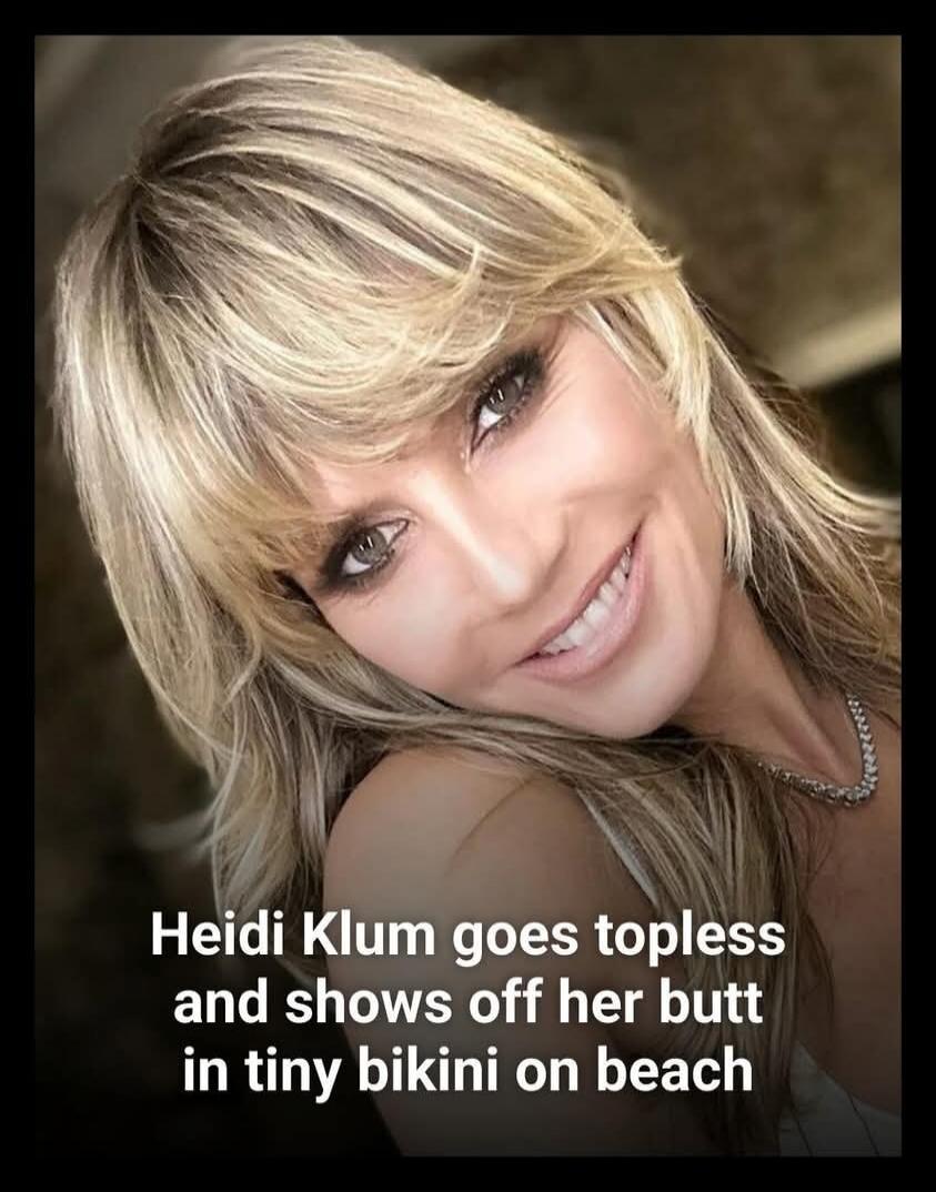 Heidi Klum goes topless and shows off her butt in tiny bikini on beach