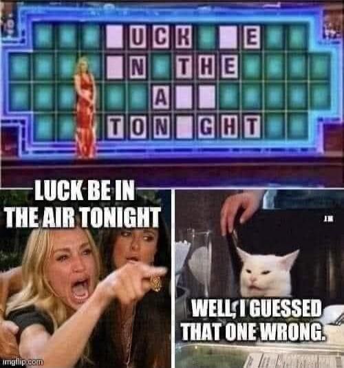 The image shows a Wheel of Fortune puzzle board with some letters revealed, appearing to spell a vulgar phrase like 'FUCK ME IN THE ASS TONIGHT' due to missing letters. Below, the 'Woman Yelling at a Cat' meme shows the correct phrase 'LUCK BE IN THE AIR TONIGHT'. The 'Smudge the Cat' meme reacts with 'WELL, I GUESSED THAT ONE WRONG.'