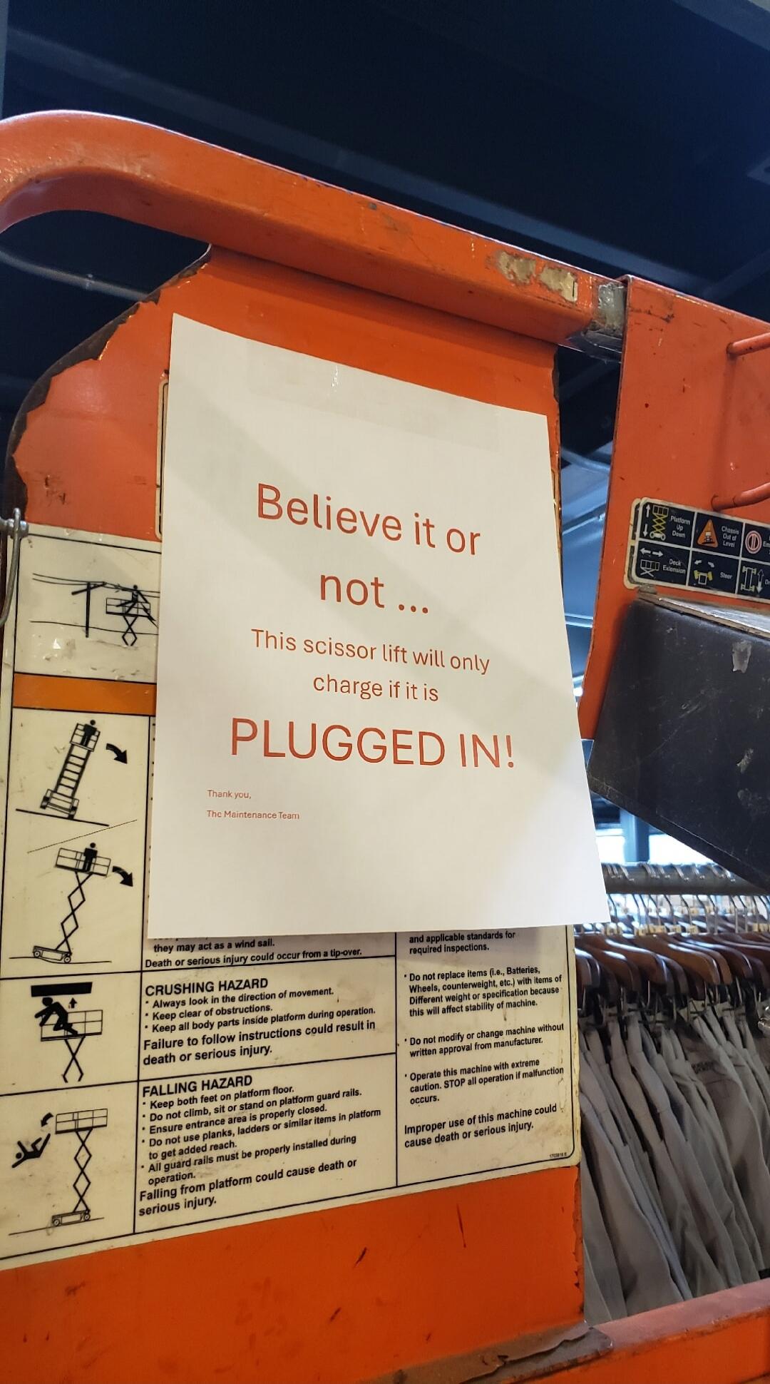 Believe it or not... This scissor lift will only charge if it is PLUGGED IN!