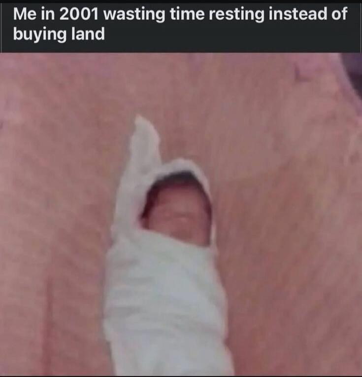 Me in 2001 wasting time resting instead of buying land