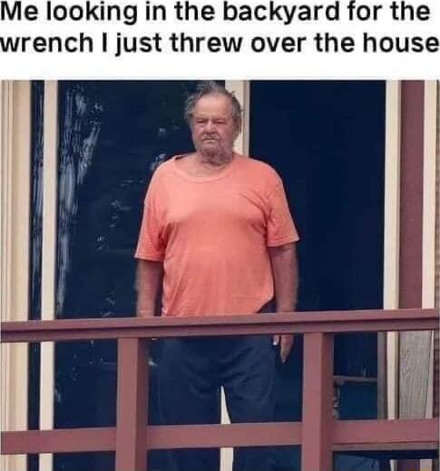 Me looking in the backyard for the rench just threw over the house