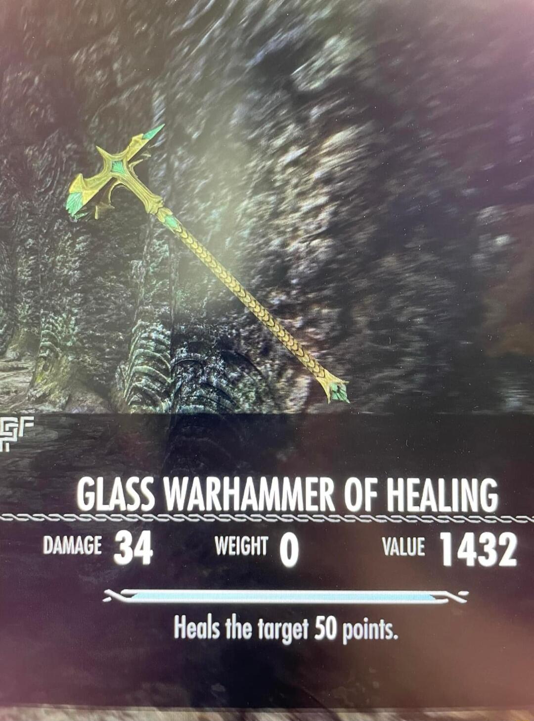 e s e GLASS WARHAMMER OF HEALING DAGE 34 weGH e 1432 Heals the target 50 points