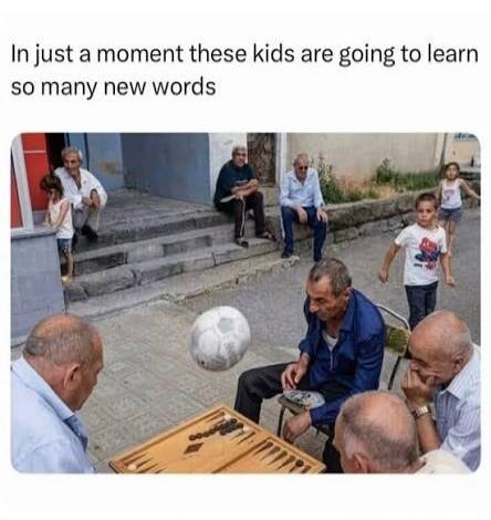 In just a moment these kids are going to learn so many new words. An image shows several elderly men playing backgammon outdoors. A soccer ball is suspended in mid-air, about to land on their game board, while children are visible in the background.