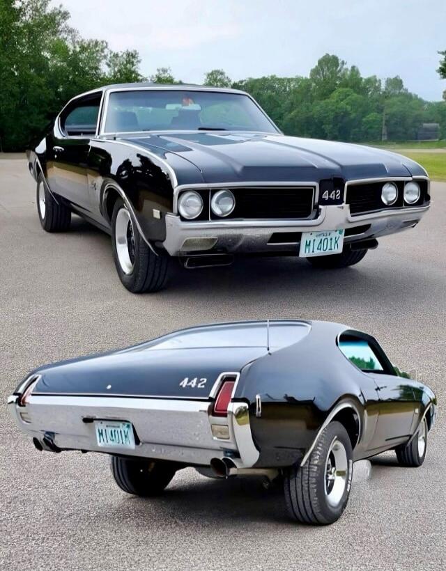 Front view of a black classic car with a prominent 442 badge on the grille. Rear view showing 442 badge and dual exhausts. Both views feature a vintage muscle car style with chrome accents and license plates reading 'MI 401K' (approximately).