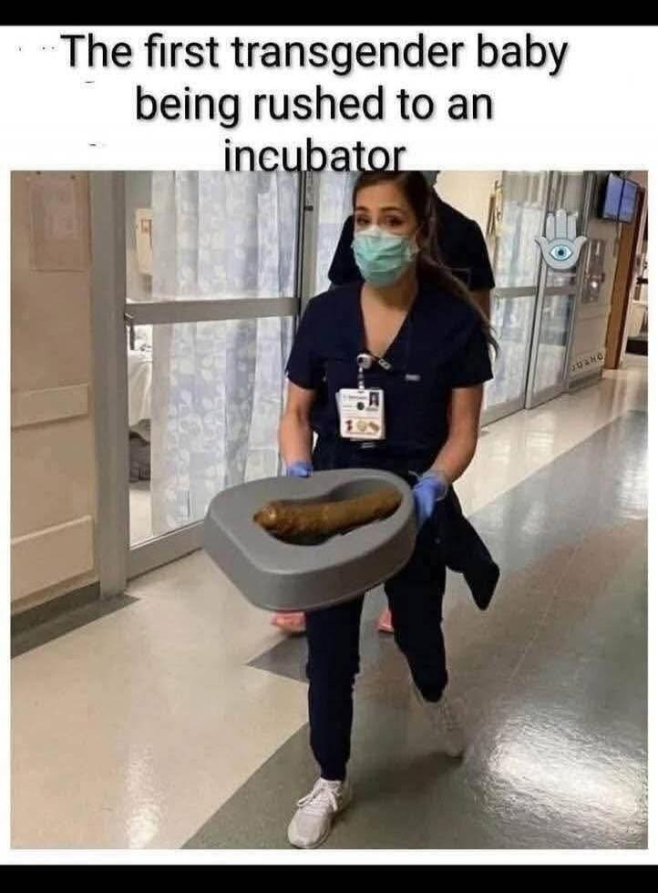 The first transgender baby being rushed to an incubator. A medical professional in scrubs and a mask is carrying a bedpan containing a very large piece of feces down a hospital hallway.