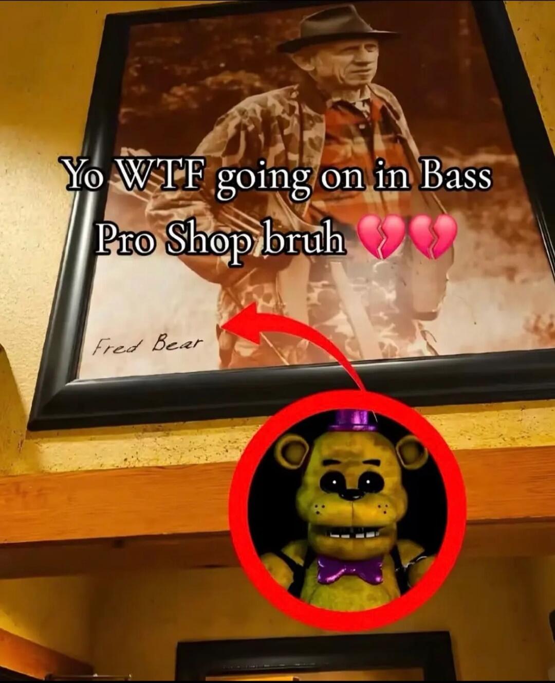 Yo WTF going on in Bass Pro Shop bruh 💔💔 Fred Bear. A meme connecting the name Fred Bear from a framed picture to Golden Freddy from Five Nights at Freddy's.