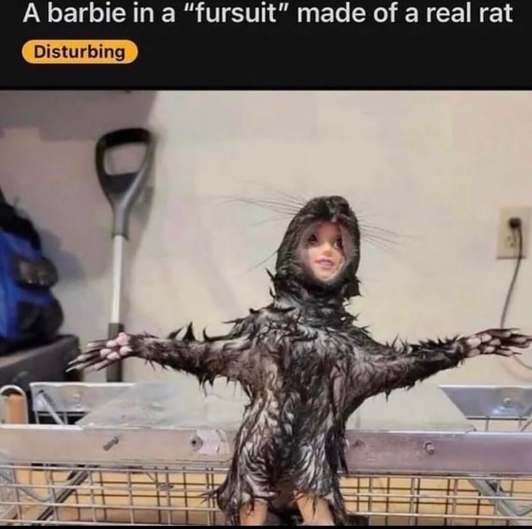 A barbie in a fursuit made of a real rat