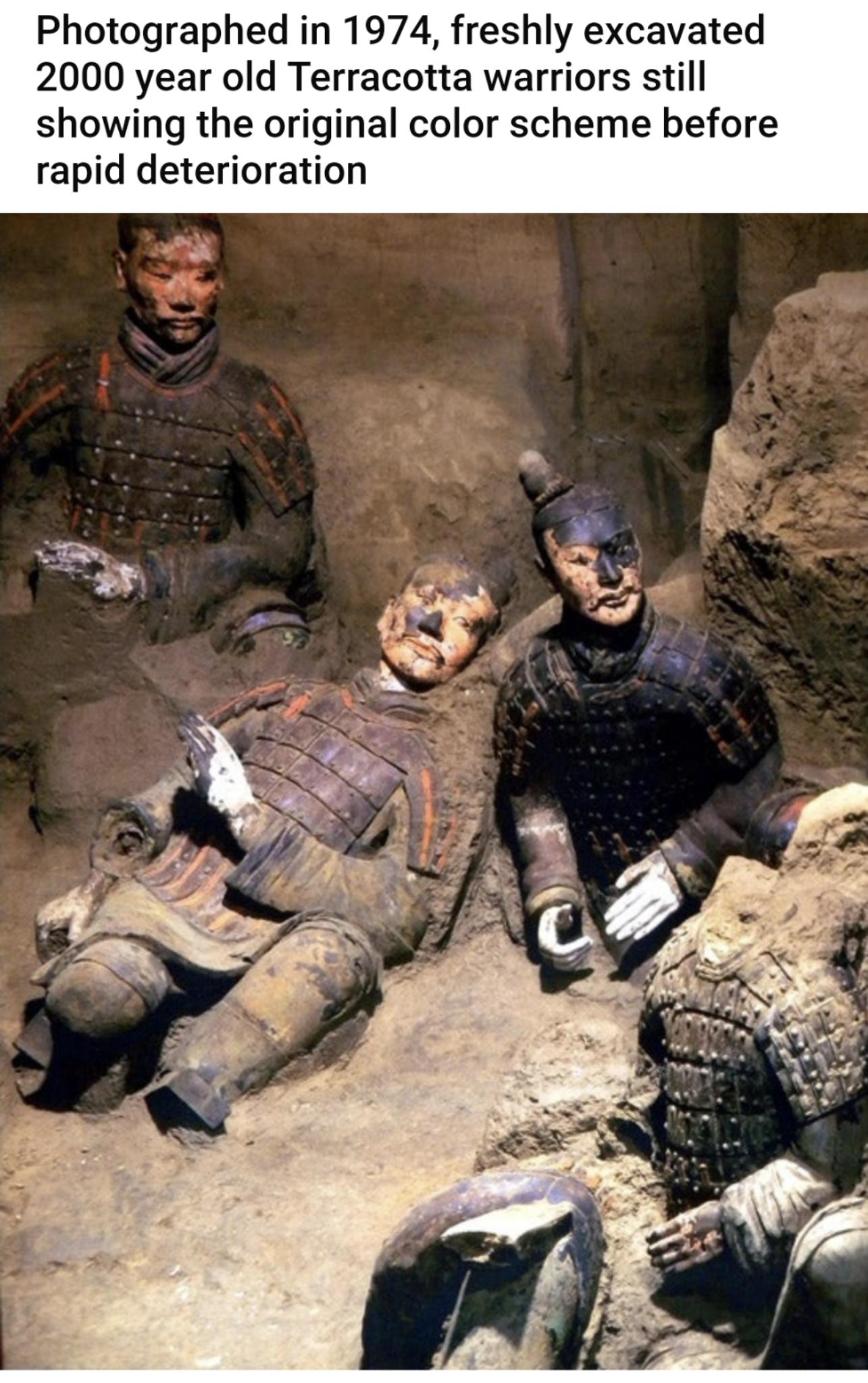 Photographed in 1974 freshly excavated 2000 year old Terracotta warriors still showing the original color scheme before rapid deterioration