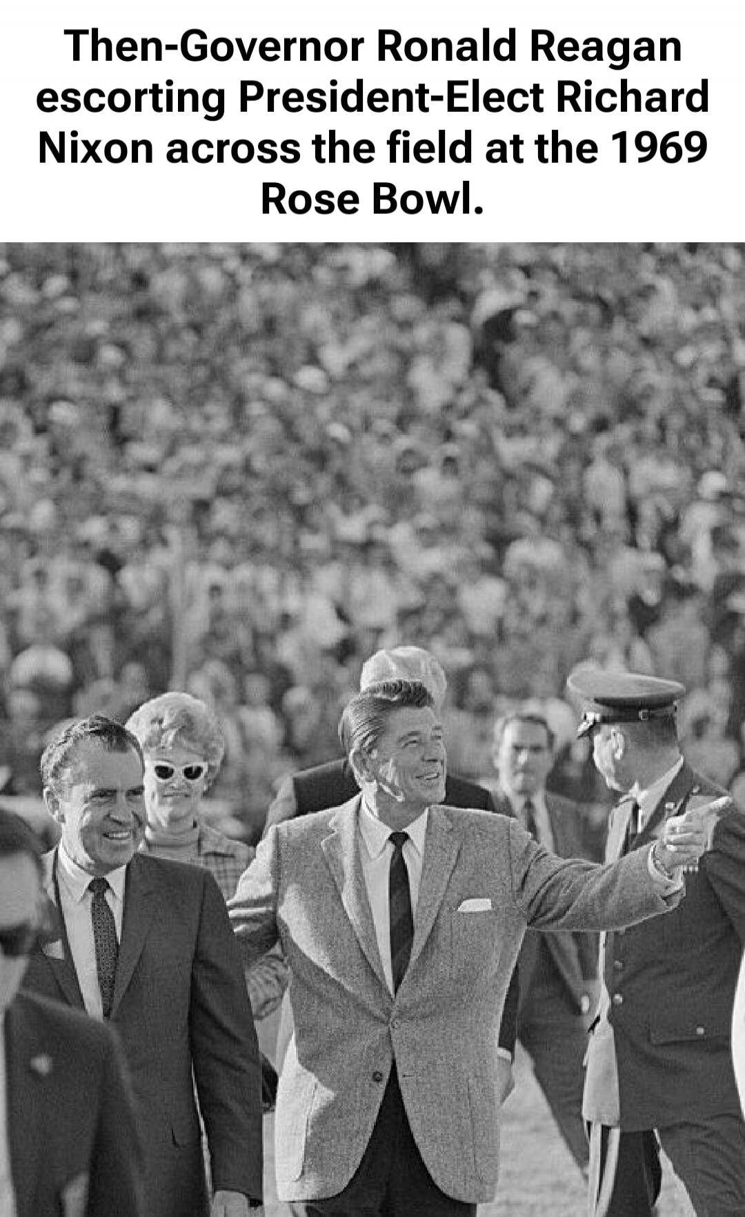 Then-Governor Ronald Reagan escorting President-Elect Richard Nixon across the field at the 1969 Rose Bowl.