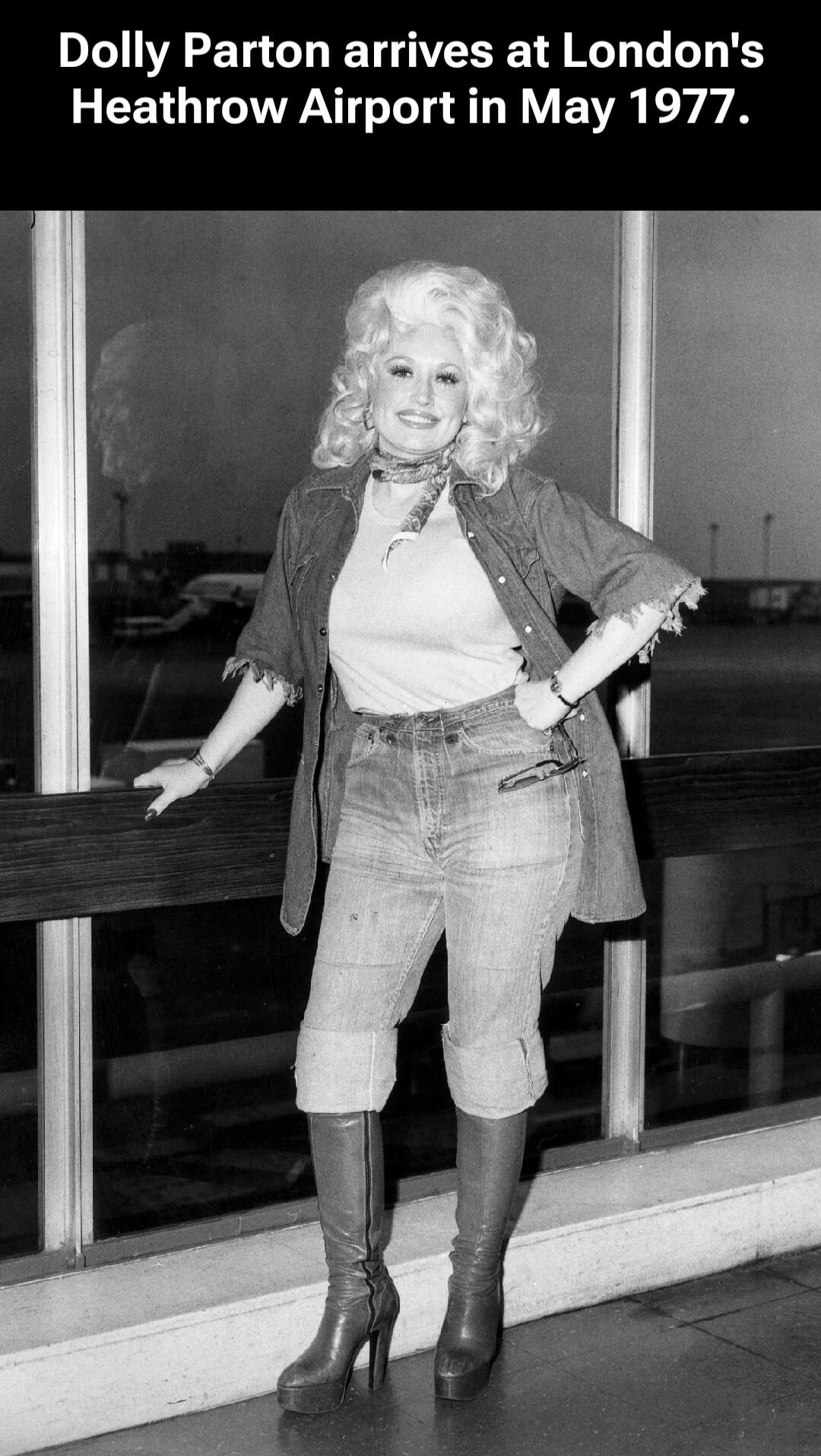 Dolly Parton arrives at London's Heathrow Airport in May 1977.