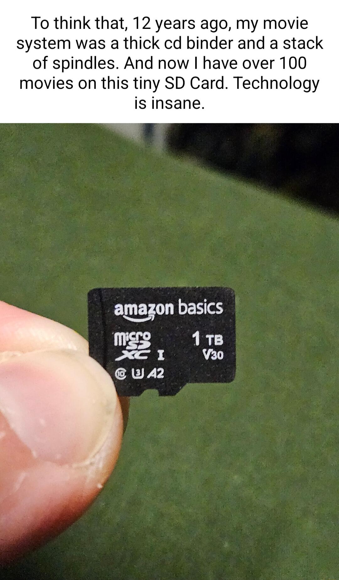 To think that 12 years ago my movie system was a thick cd binder and a stack of spindles And now have over 100 movies on this tiny SD Card Technology is insane amagzon basics me3 118 P Va0 AU