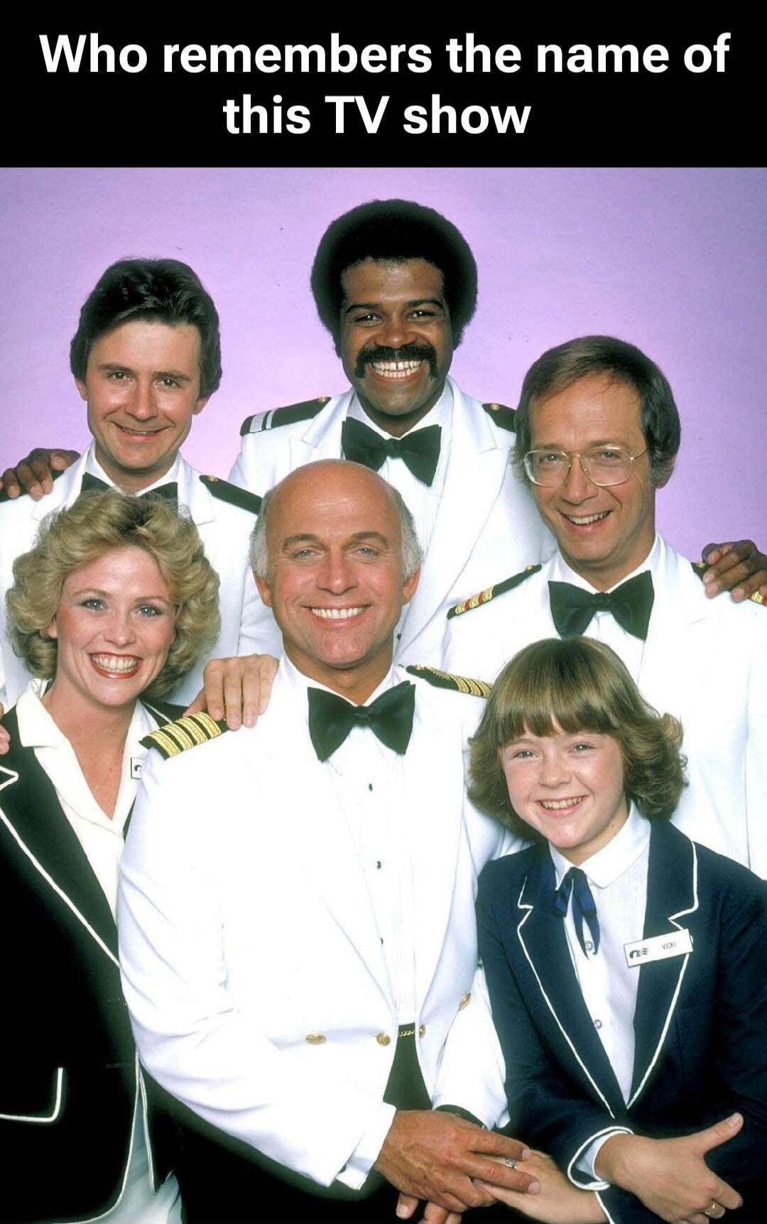 Who remembers the name of this TV show. A group of six smiling people, dressed in cruise ship uniforms, posing for a photo. This is the cast of 'The Love Boat'.