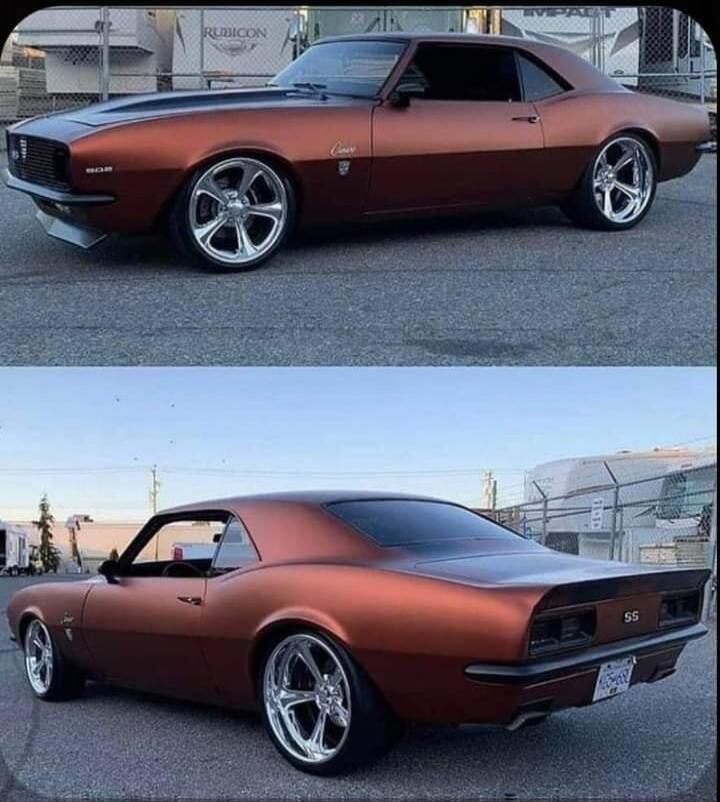 This is a custom Chevrolet Camaro SS from the late 1960s. It features a unique copper metallic paint job and large chrome wheels. The car has been modified with a lowered suspension and a custom body kit, giving it a more aggressive stance. The interior appears to be in excellent condition, with black leather seats and a modern infotainment system.