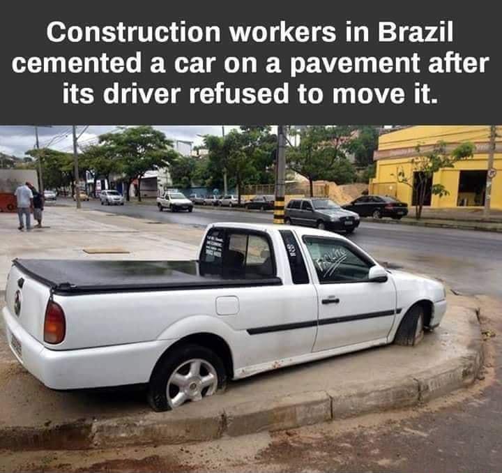 Construction workers in Brazil 0 CL Gl IR O I W AL L R G g its driver refused to move it