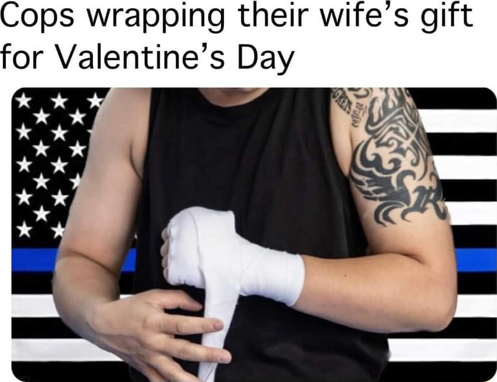 Cops wrapping their wifes gift for Valentines Day