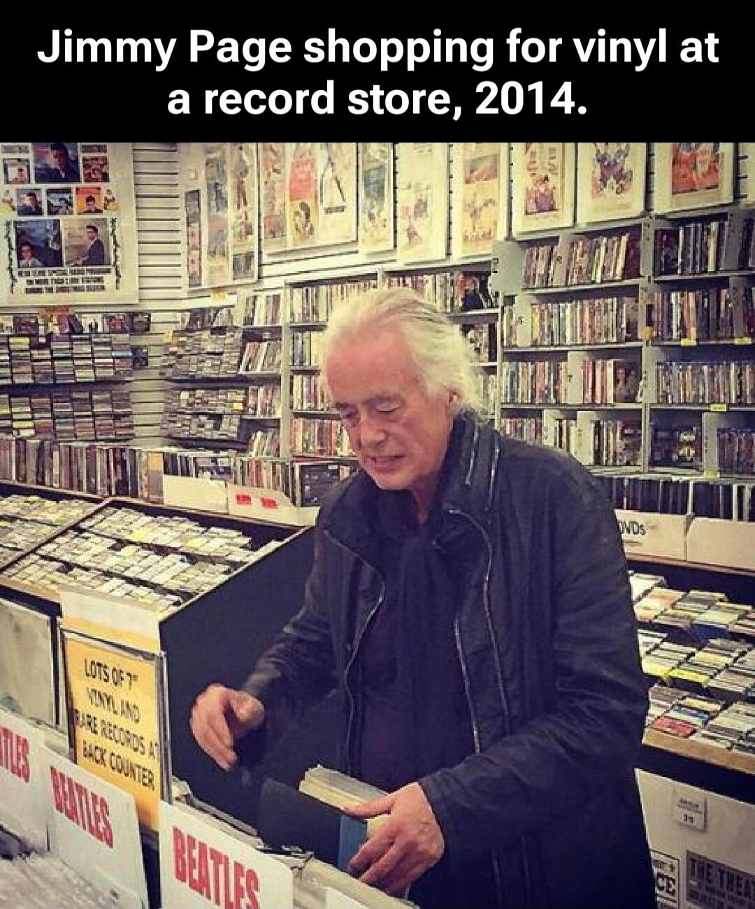 Jimmy Page shopping for vinyl at a record store, 2014.
