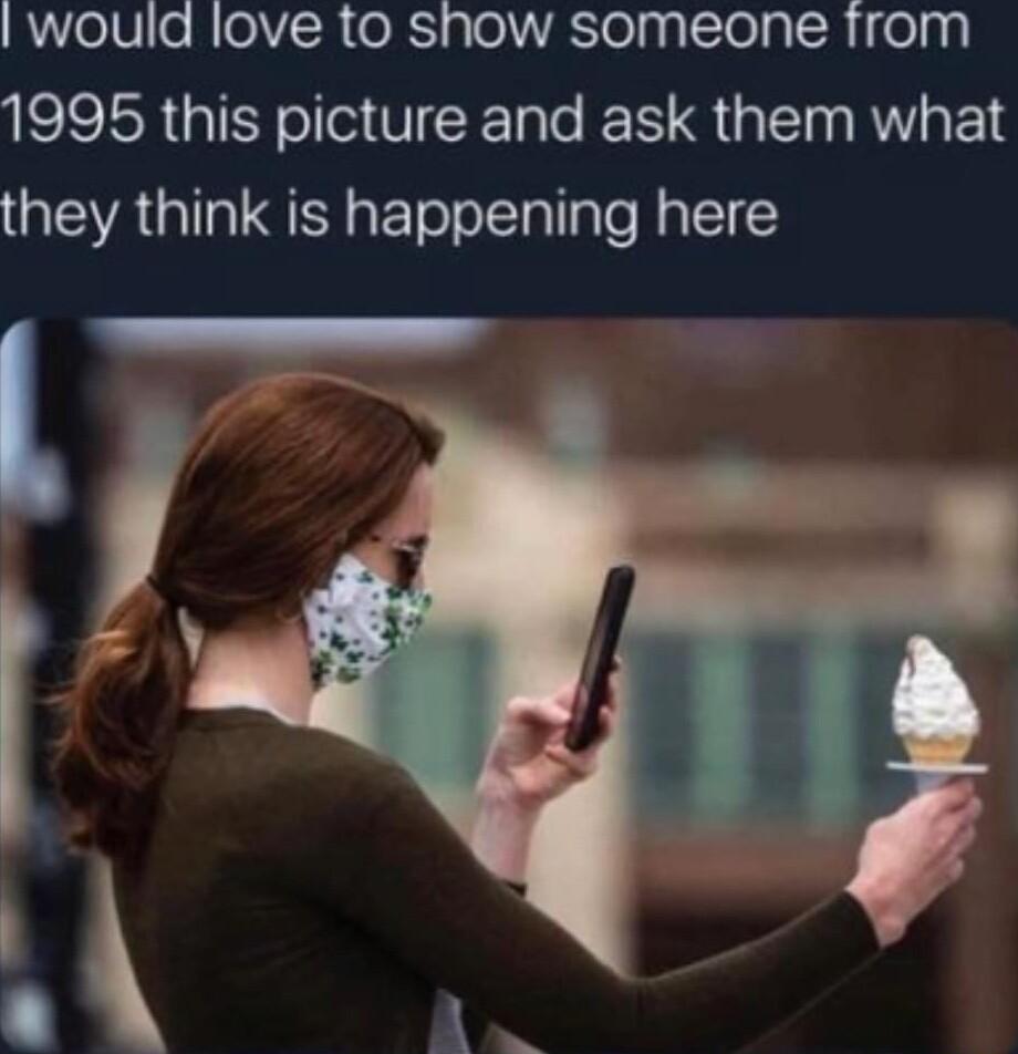 would love to show someone from 1995 this picture and ask them what they think is happening here
