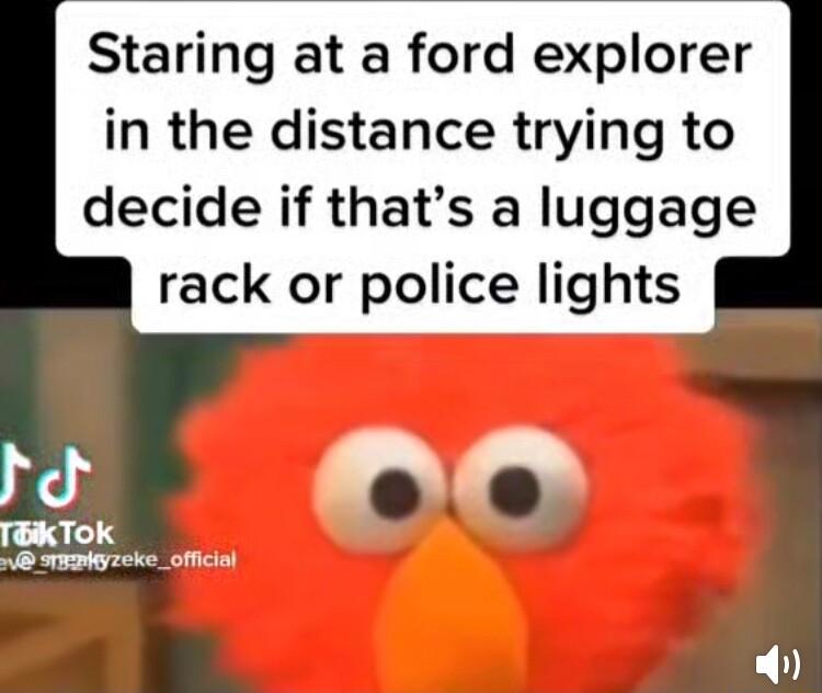 Staring at a ford explorer in the distance trying to decide if thats a luggage rack or police lights