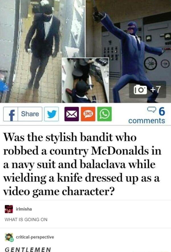 comments Was the stylish bandit who robbed a country McDonalds in a navy suit and balaclava while wielding a knife dressed up as a video game character HAT IS GOING ON R e penpectie GENTLEMEN
