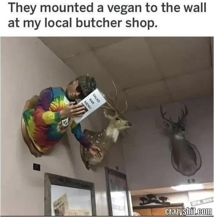 They mounted a vegan to the wall at my local butcher shop. SALAD BAR MENU