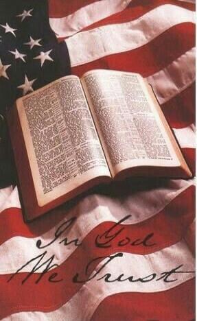 Open Bible over American flag. The phrase 'In God We Trust' is visible.