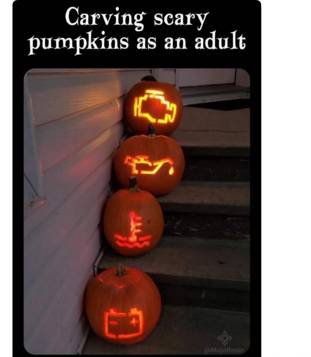 Carving scary pumpkins as an adult. The pumpkins are carved with car dashboard warning lights: check engine, oil pressure, engine temperature, and battery.