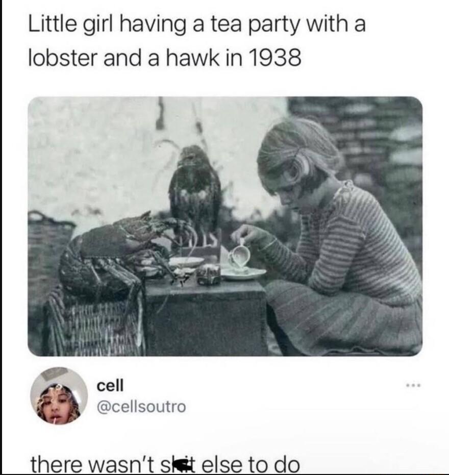 Little girl having a tea party with a lobster and a hawk in 1938 cell there wasnt st else to do