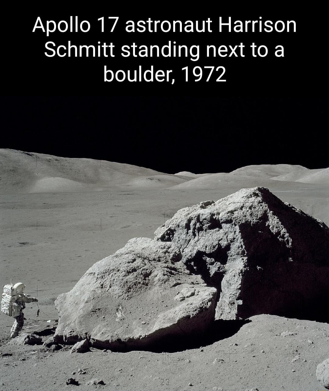 PaYolo l WA Y i o TV AR Y TSIy Schmitt standing next to a boulder 1972