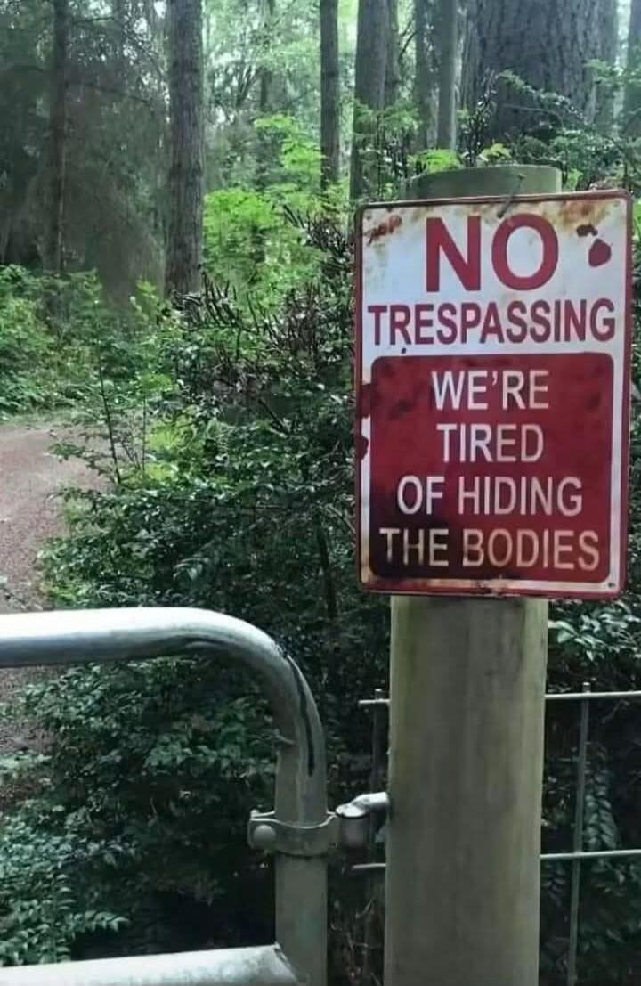 NO TRESPASSING WE'RE TIRED OF HIDING THE BODIES