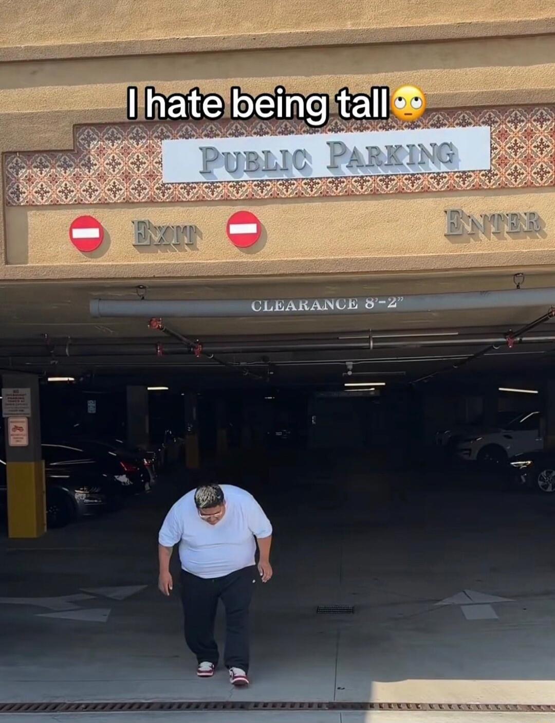 I hate being tall 🙄 PUBLIC PARKING EXIT ENTER CLEARANCE 8'-2''