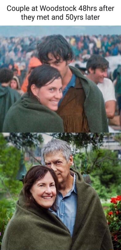 Couple at Woodstock 48hrs after they met and 50yrs later. The image shows a split view: the top part features a young couple at the Woodstock festival, wrapped in a blanket, with a large crowd in the background. The bottom part shows the same couple 50 years later, now older, still wrapped in a similar blanket, smiling at the camera in a green outd