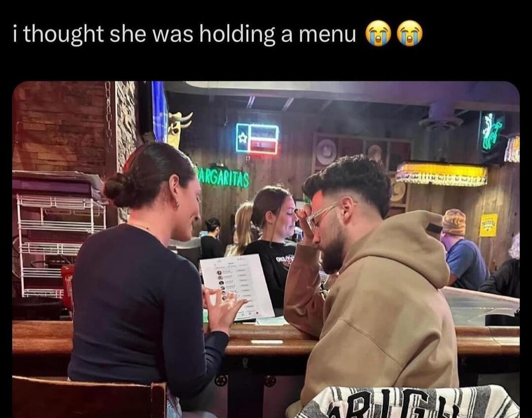 i thought she was holding a menu