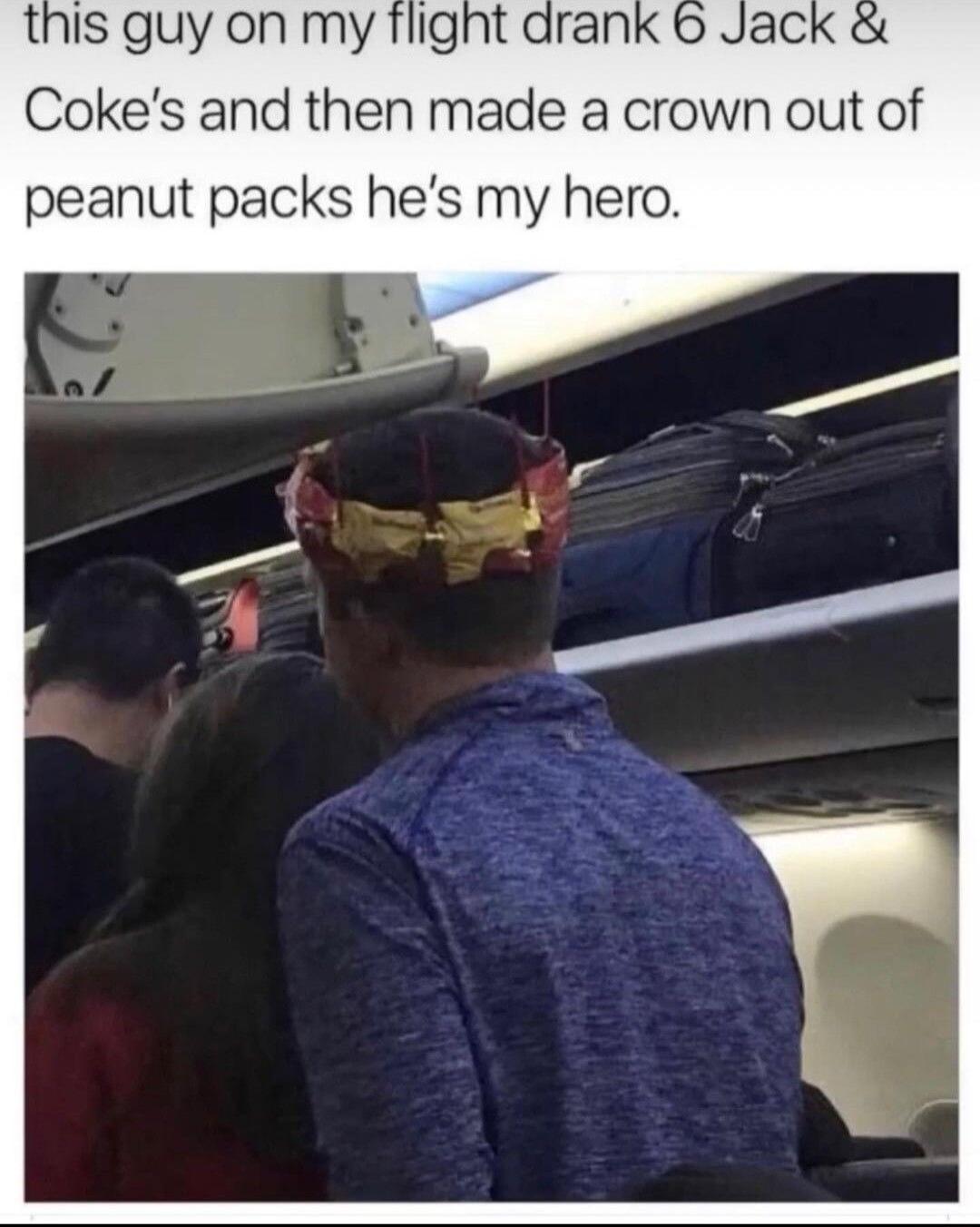 this guy on my flight drank Jac Cokes and then made a crown out of peanut packs hes my hero