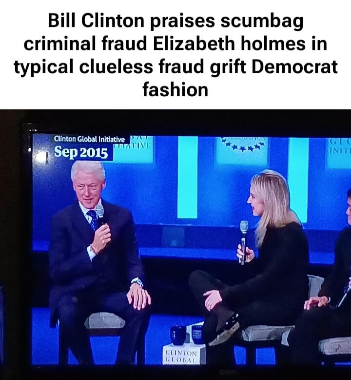 Bill Clinton praises scumbag criminal fraud Elizabeth Holmes in typical clueless fraud grift Democrat fashion. On screen: Clinton Global Initiative, Sep 2015. Mugs/stand say 'Clinton Global'.