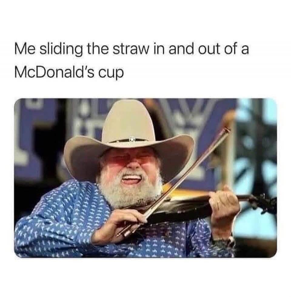 Me sliding the straw in and out of a McDonald's cup