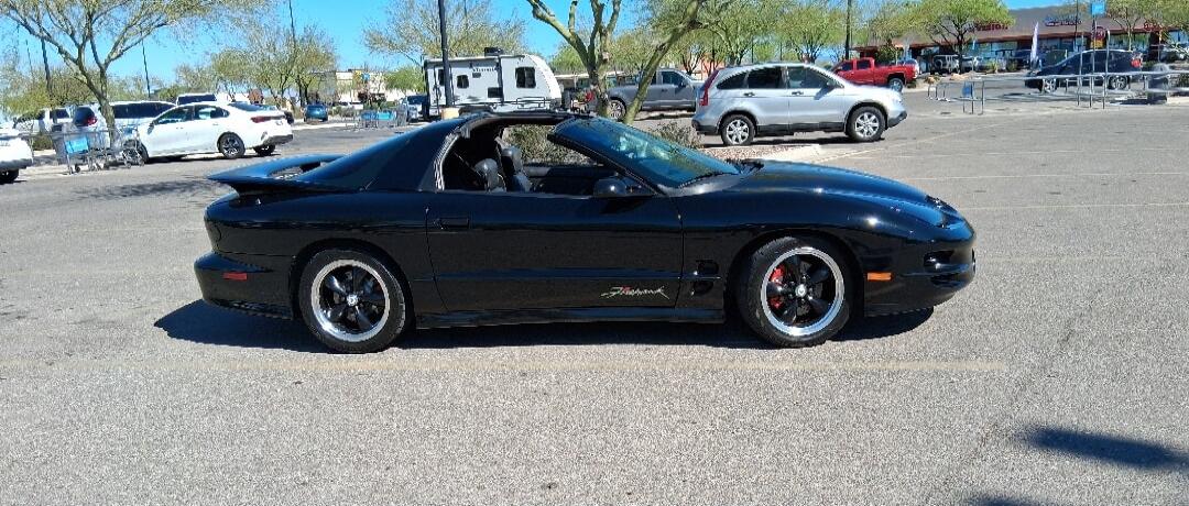 The car has 'Firebird' written on its side.