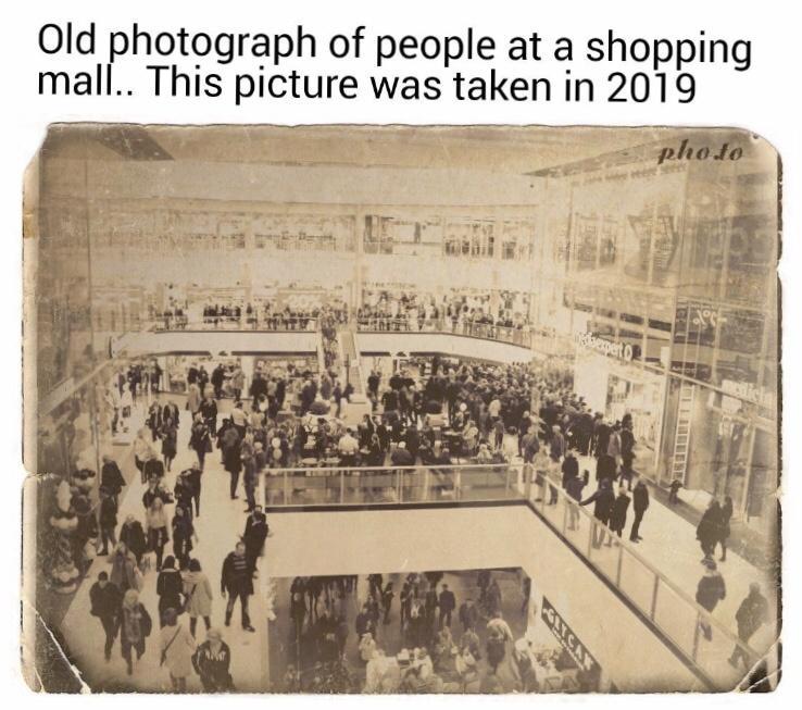 Old photograph of people at a shopping mall This picture was taken in 2019