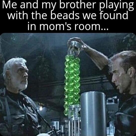 Me and my brother playing with the beads we found in mom's room...