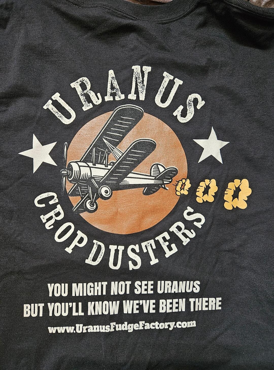 URANUS CROPDUSTERS\nYOU MIGHT NOT SEE URANUS BUT YOU'LL KNOW WE'VE BEEN THERE\nwww.UranusFudgeFactory.com