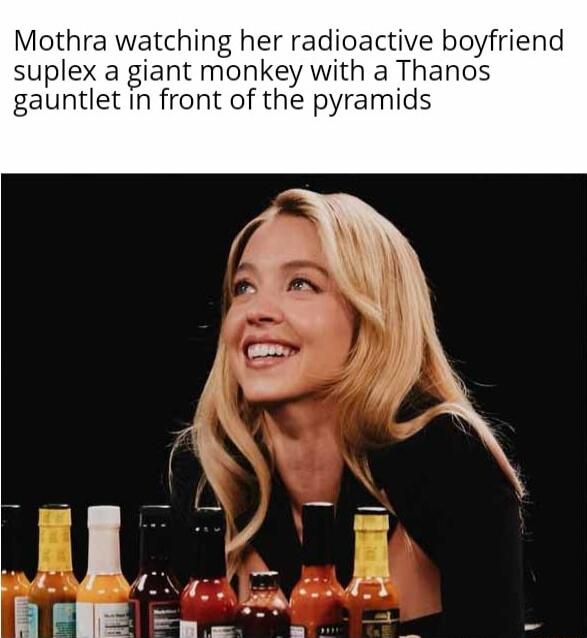 Mothra watching her radioactive boyfriend suplex a giant monkey with a Thanos gauntlet in front of the pyramids