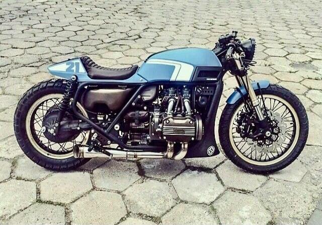 Blue vintage cafe racer motorcycle.