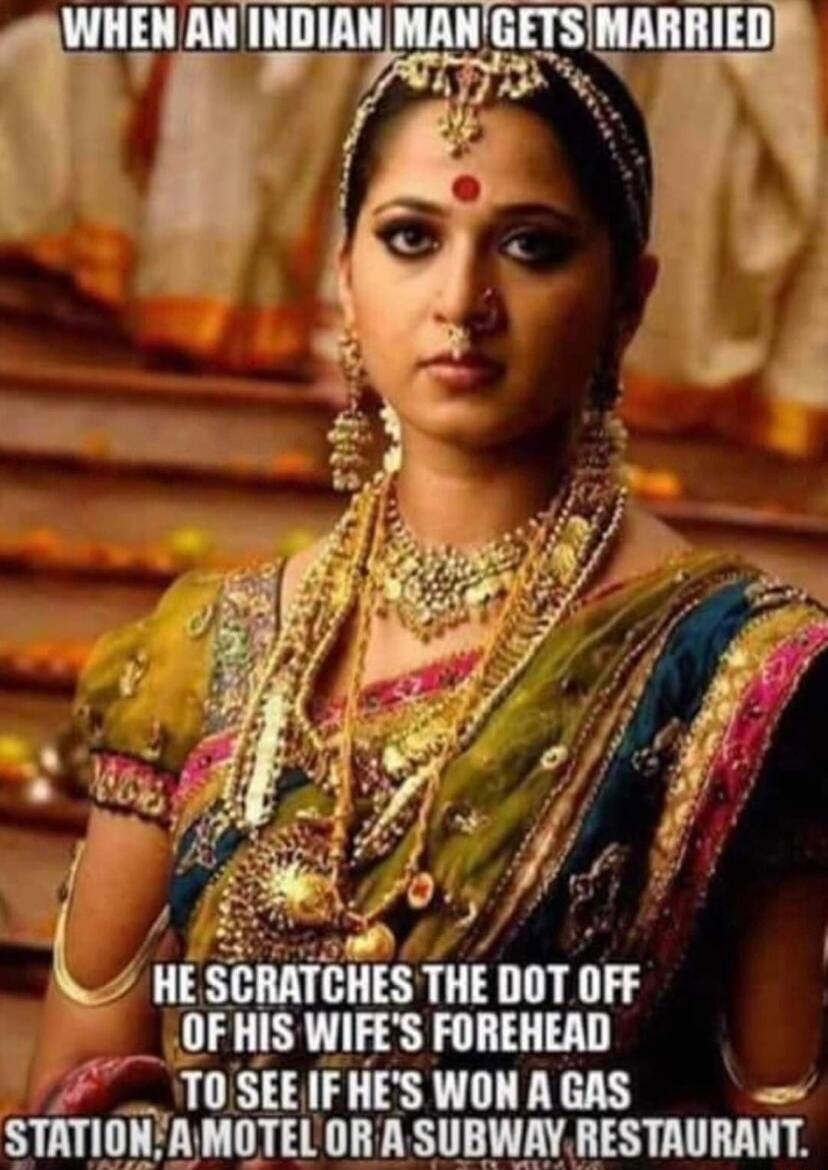 E SCRATCHES THE DOT IIFF __OFHIS WIFES FOREHEAD _ TOSEEIF IIES WON A GAS