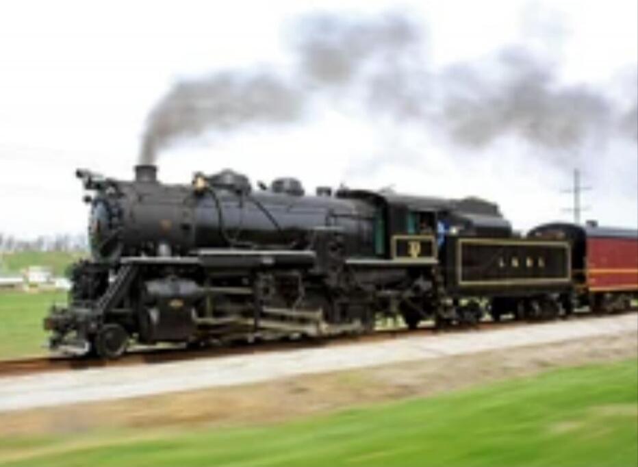 A steam locomotive pulling a train.