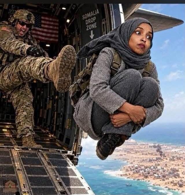 A soldier in military uniform is kicking a woman out of an airplane. The woman is wearing a hijab and looks distressed, holding her knees. A sign inside the plane reads 'SOMALIA DROP ZONE'. Below, a coastal landscape with smoke plumes is visible.