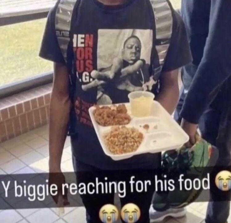 m T S S Y biggie reaching for his food Y