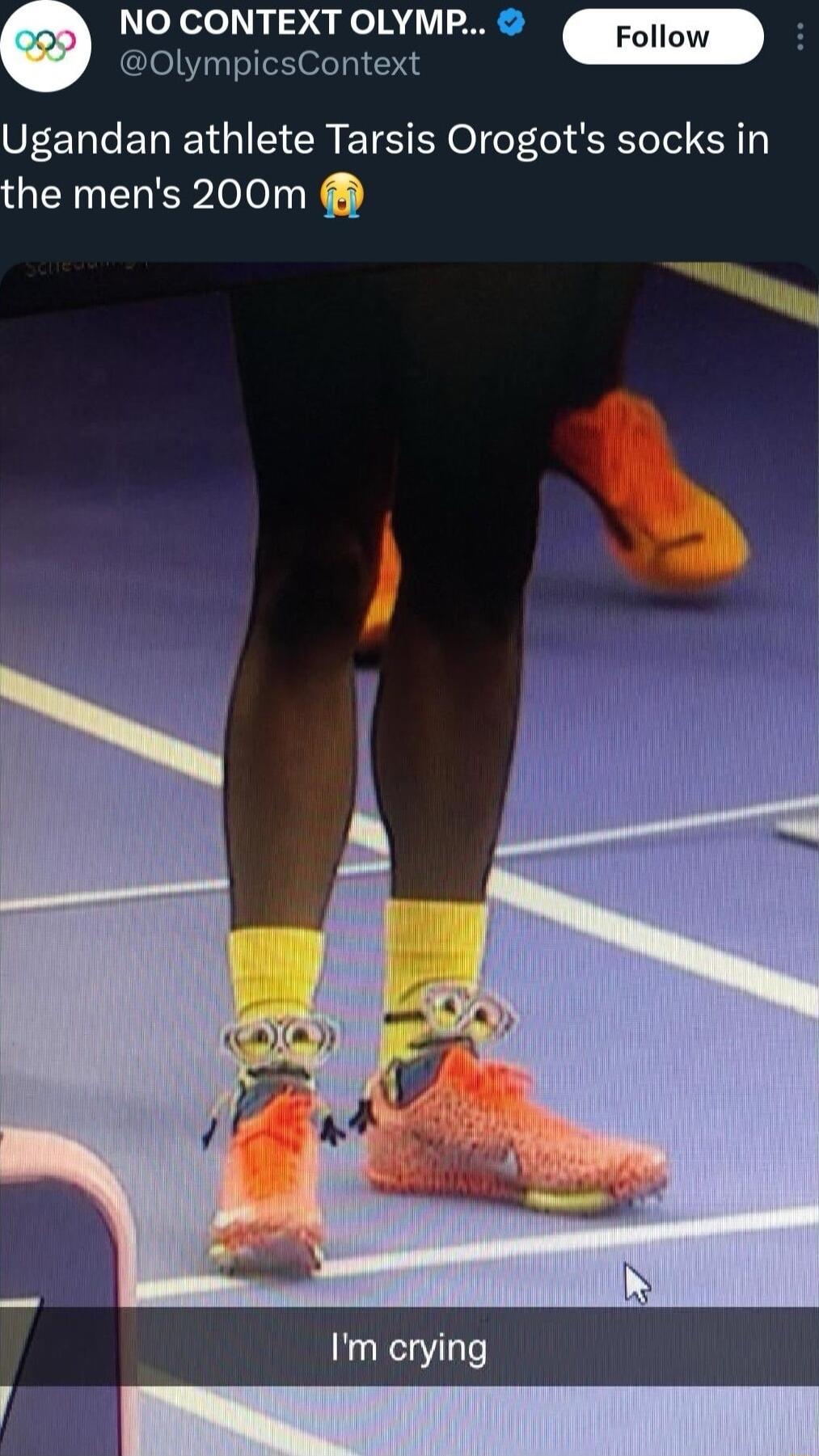 NO CONTEXT OLYMP OlympicsContext Ugandan athlete Tarsis Orogots socks in the mens 200m Im crying