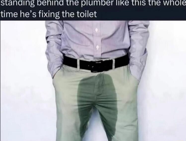 standing behind the plumber like this the whole time he's fixing the toilet