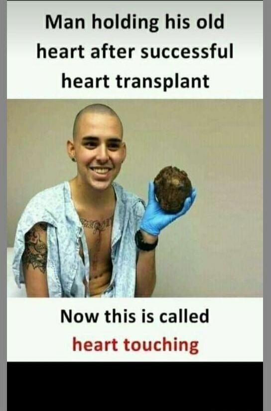 Man holding his old heart after successful heart transplant Now this is called heart touching