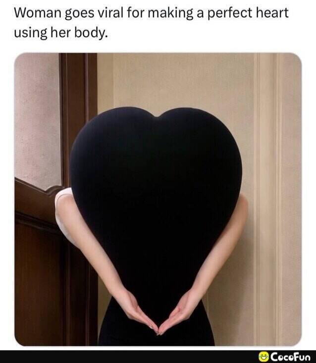Woman goes viral for making a perfect heart using her body.