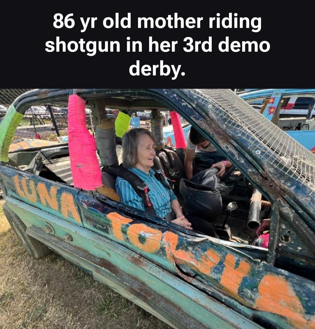 86 yr old mother riding shotgun in her 3rd demo derby.
